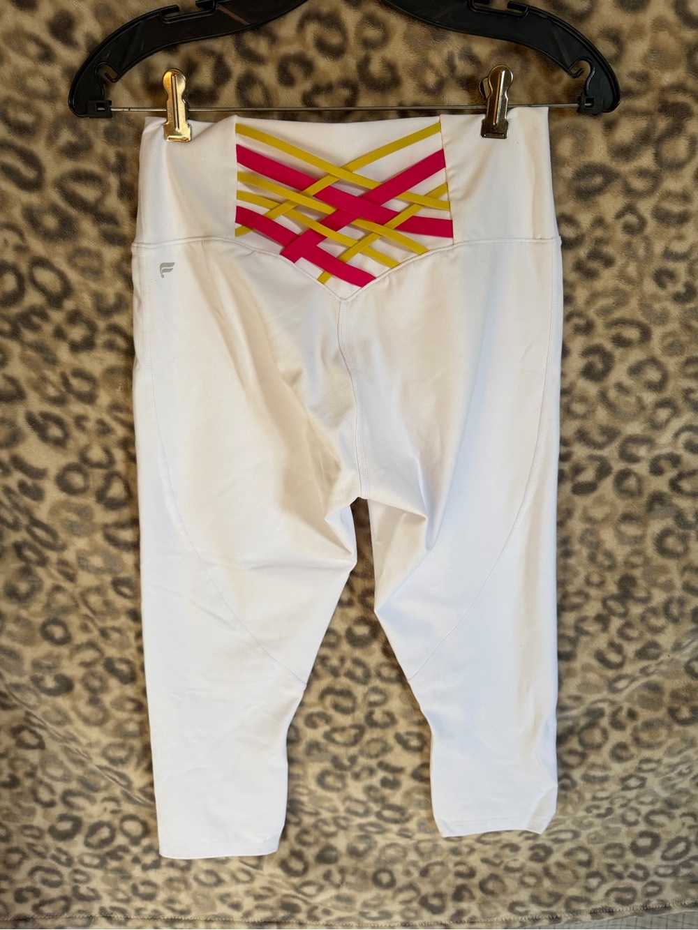 Fabletics White Capri Leggings with Pink and Yellow Crisscross Waistband